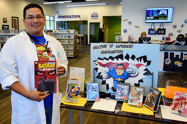 Dr. Martinez with superhero comics