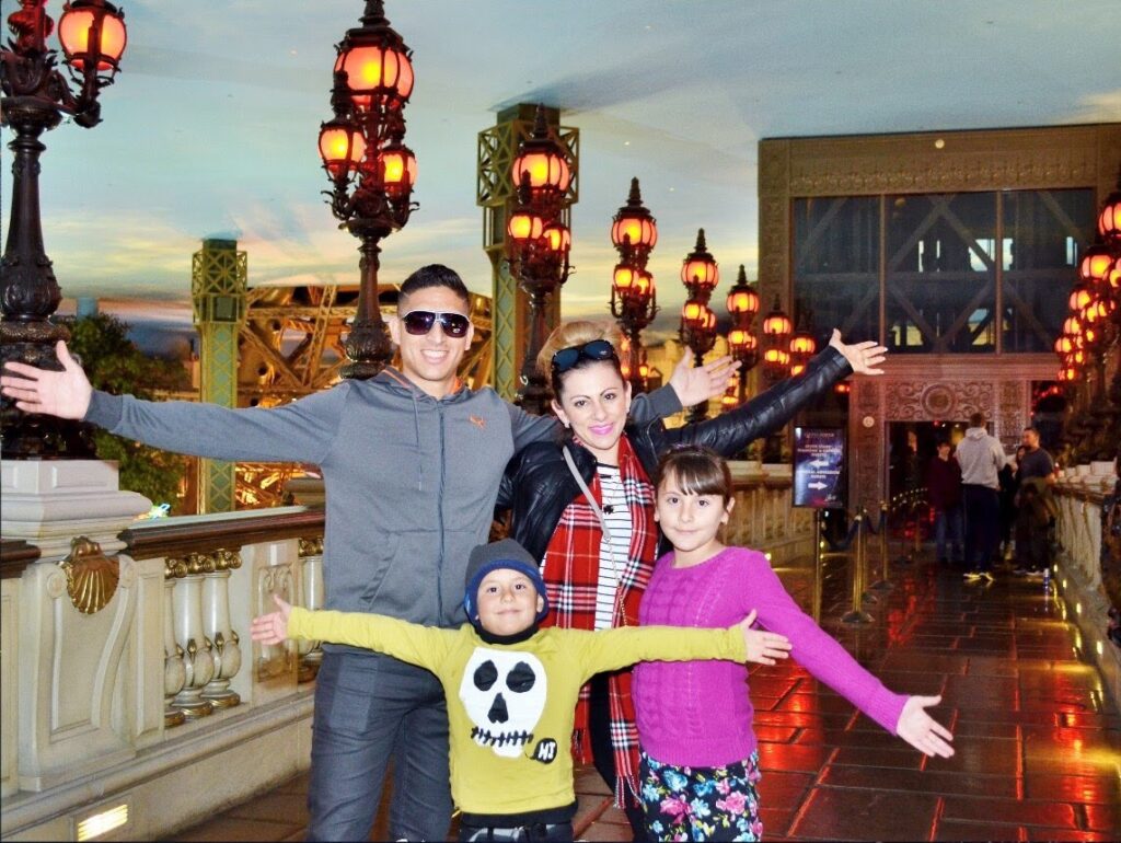Carlos with his wife and kids